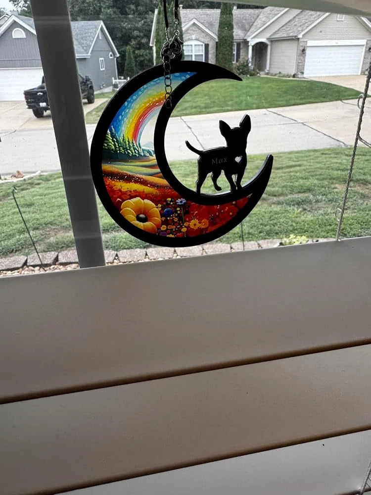 K. Martin’s review photo of a pet memorial suncatcher hanging in a window