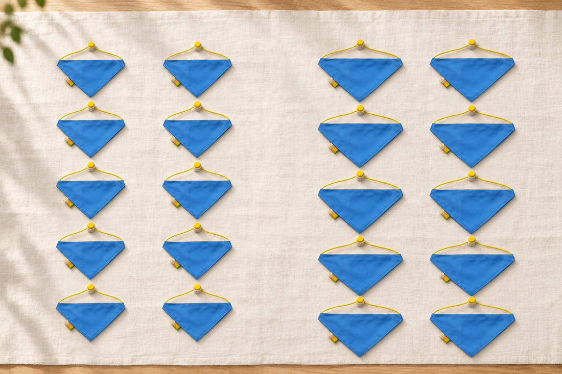 AI-created assortment illustration: 20 blue cord-and-toggle bandanas, 10 small on the left and 10 medium on the right.