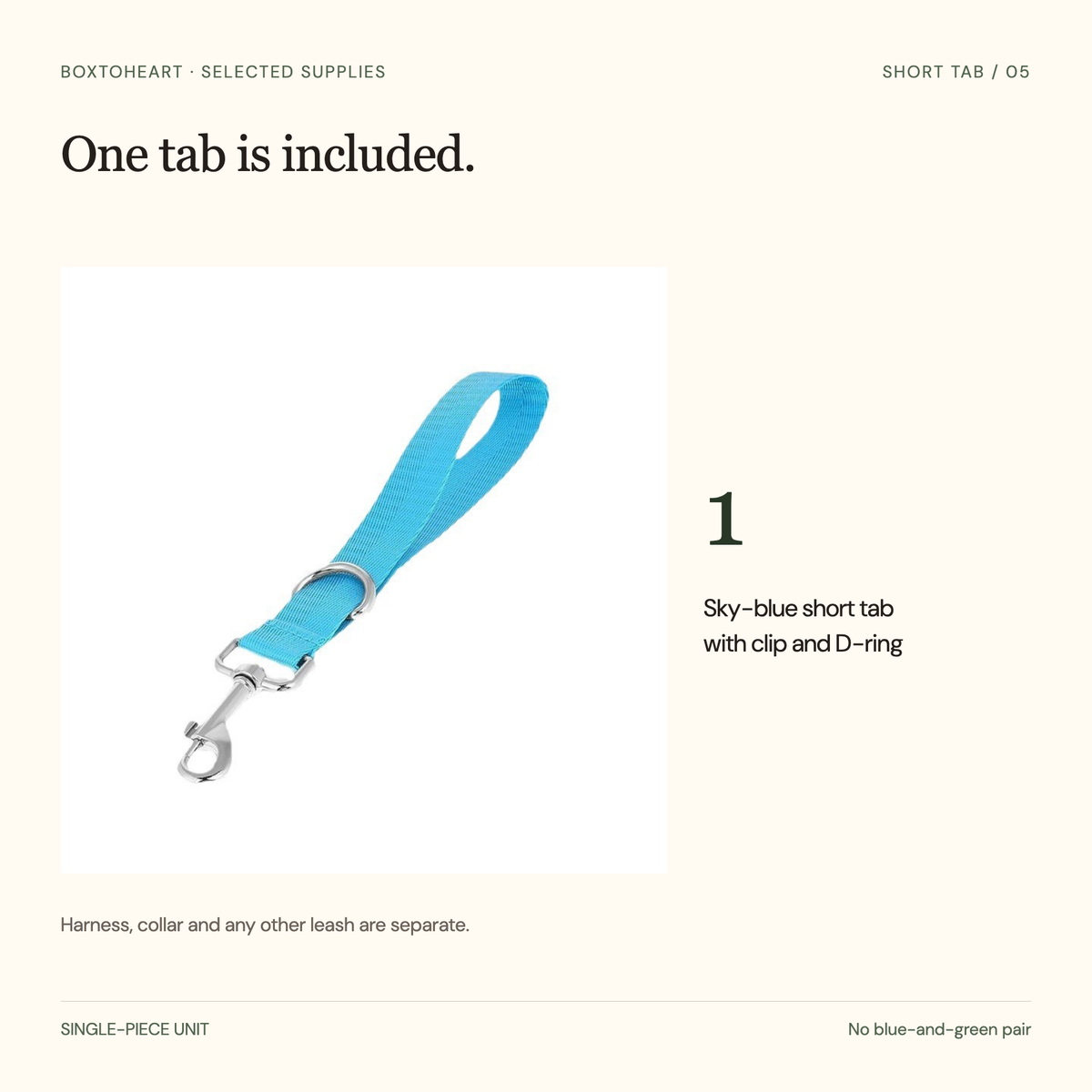 Contents board showing one sky-blue short tab with its clip and D-ring; harness, collar and other leash are separate.