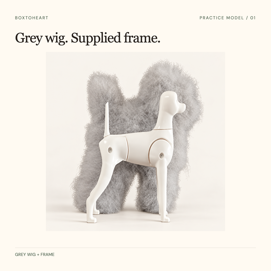 Paired grey full-body practice wig behind its separate white frame, against a warm background.