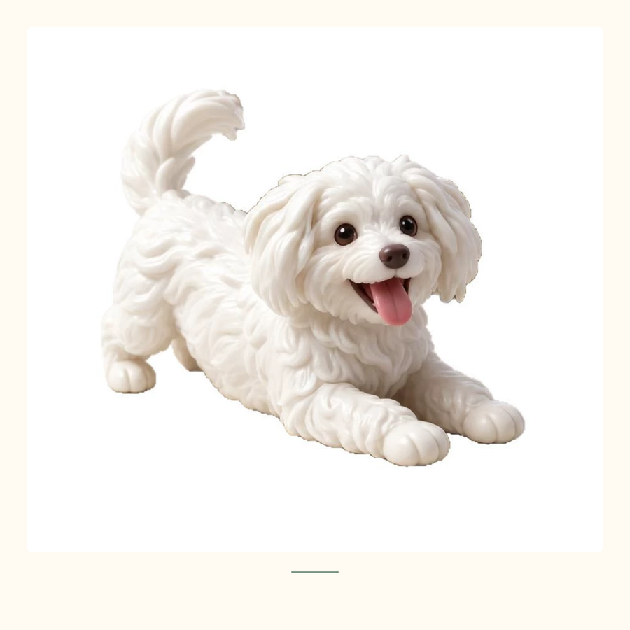 A white stylized resin dog figurine.