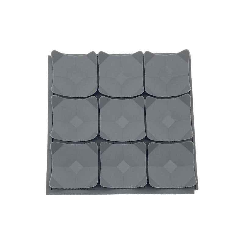 Supplier photograph of one of the two grey mats, showing its nine leaf pockets in a three by three arrangement.