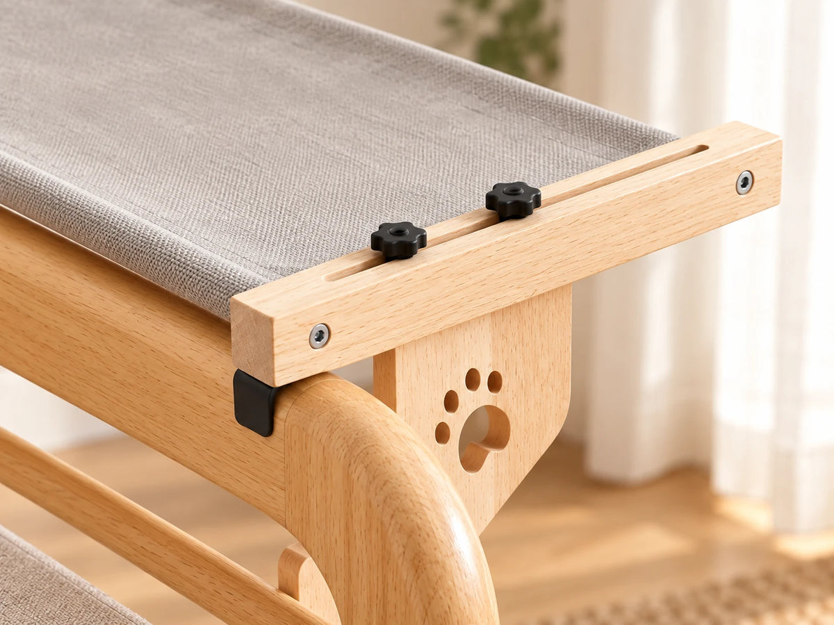 Visible wood rail, fasteners, fabric edge and paw-cut support at the chair arm